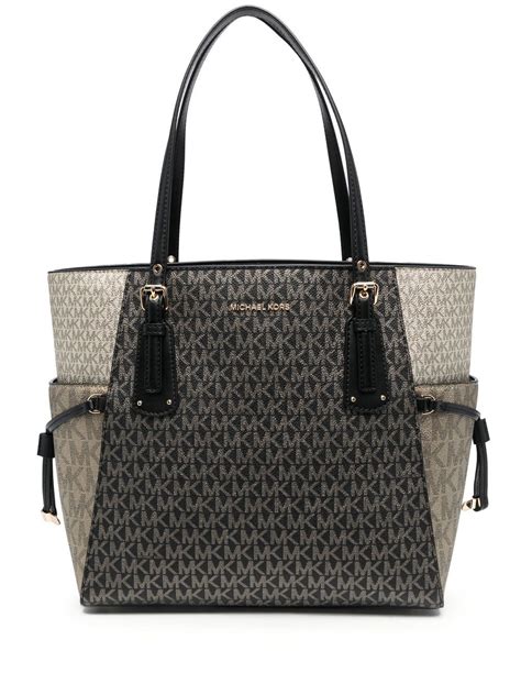 michael kors voyager lg ns tote|Michael Kors go bag.